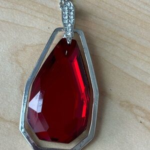 Large red pendant necklace/ silver tone chain/ measures 36 in length